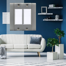 Load image into Gallery viewer, Classic Solid Brass with Pewter Plaiting double Rocker Wall-plate in front of a blue living room with white furniture