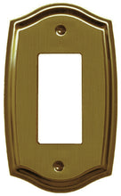 Load image into Gallery viewer, Antique Brass Plated Wallplate, polished sheen finish, elegant Colonial curved pattern, single rocker decora configuration. 4 1/8" x 2 7/8", 10.48cm x 7.30cm.