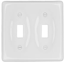 Load image into Gallery viewer, Kiln fired glossy white ceramic porcelain wall plate will accent your bath, spa, or kitchen, or any room where you desire a clean, expensive look that is easy to clean and stays sparkling white forever. A timeless and versatile accent that will prove its durability, high quality and beauty for years to come. Screws Included. Be careful not to over-tighten screws to avoid cracking the plate. Do not use automatic screwdrivers. Electrical Cover Plate size: 2 3/4" x 4 1/2", 6.98cm x 11.43cm.