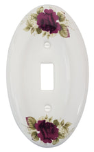 Load image into Gallery viewer, Kiln fired gloss white genuine porcelain wall plate. One of a Kind Charming Red Roses with green leaves floral pattern on an oval cover plate for bathroom, spa, or kitchen. high quality and durability. Stays white and shiny or years to come. Single Toggle cover plate configuration. Screws Included. Easy to clean with a damp cloth. Do not over tighten screws to avoid cracking the plate. Do not use automatic screwdrivers.