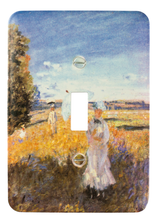 Load image into Gallery viewer, Artist's reproduction on over-sized metal wall plate. Printed with die-sublimation technology for durability. Famous Monet's La Promenade. Single toggle configuration. 5" x 3 1/2" 12.7cm x 8.89cm. Color matching screws included.