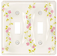 Load image into Gallery viewer, Kiln-fired gloss white genuine porcelain wall plate with One of-a Kind pink Flowering Vine pattern for bathroom, spa, or kitchen. high quality and durability. Double toggle configuration. Screws Included. Do not over-tighten screws to avoid cracking the plate. Do not use automatic screwdrivers
